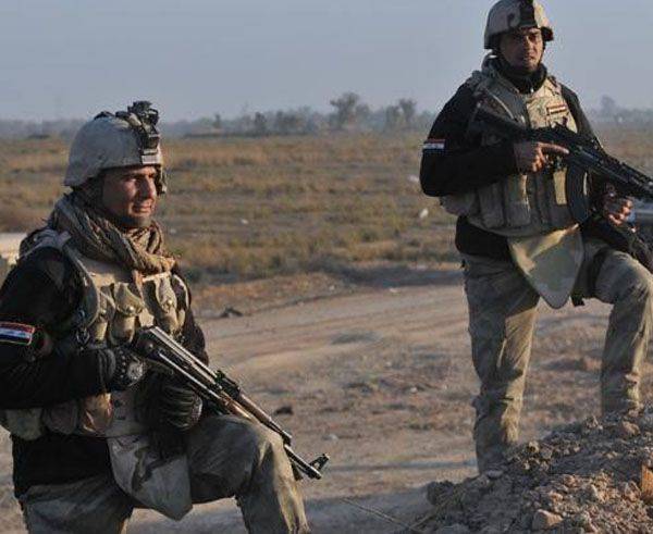 Иракская армия совместно с добровольцами выбивает боевиков ИГИЛ из Тикрита - родного города Саддама Хуссейна