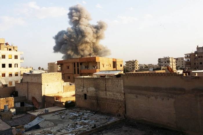 Коалиция заявила об освобождении от боевиков ИГ* более половины Ракки